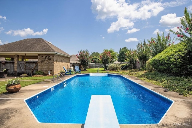 8872 Old Magnolia Way, Montgomery, AL 36116 - view of swimming pool featuring a diving board, a fenced backyard, and a patio area