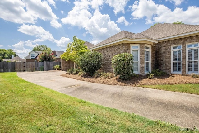 8872 Old Magnolia Way, Montgomery, AL 36116 - view of property exterior with brick siding and concrete driveway