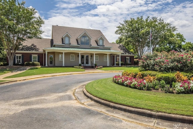 8872 Old Magnolia Way, Montgomery, AL 36116 - view of front of house with a front lawn, a porch, and french doors
