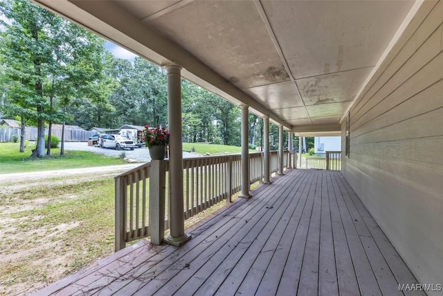 54 Pine Dr, Eclectic, AL 36024 - wooden porch with a lawn