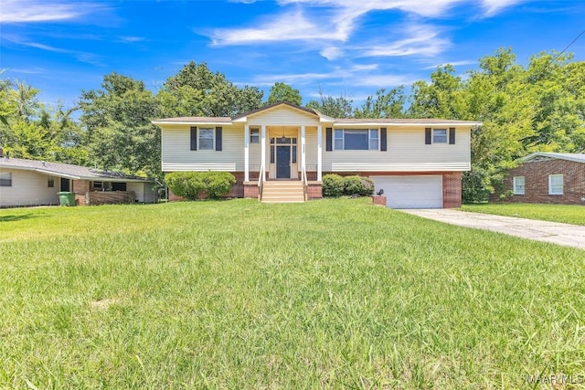 1422 Flamingo Ln, Montgomery, AL 36116 - view of front of home featuring brick siding, driveway, a garage, and a front yard