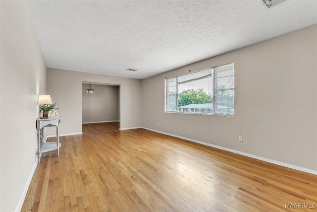 1422 Flamingo Ln, Montgomery, AL 36116 - spare room featuring light wood-style floors and a textured ceiling