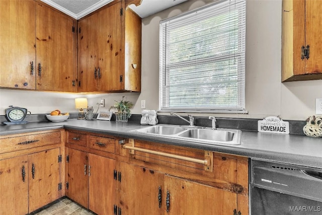 1422 Flamingo Ln, Montgomery, AL 36116 - kitchen with dishwasher, healthy amount of natural light, and brown cabinets