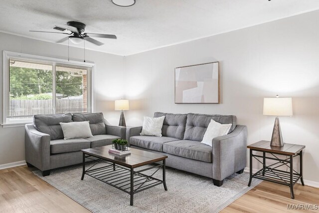 506 Lilly Ave, Tallassee, AL 36078 - living area with light wood-type flooring and a ceiling fan