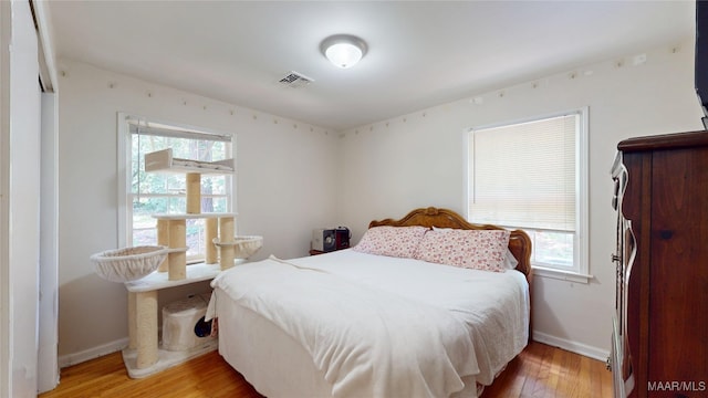 1706 Celia Ct, Montgomery, AL 36106 - bedroom with multiple windows and light wood finished floors