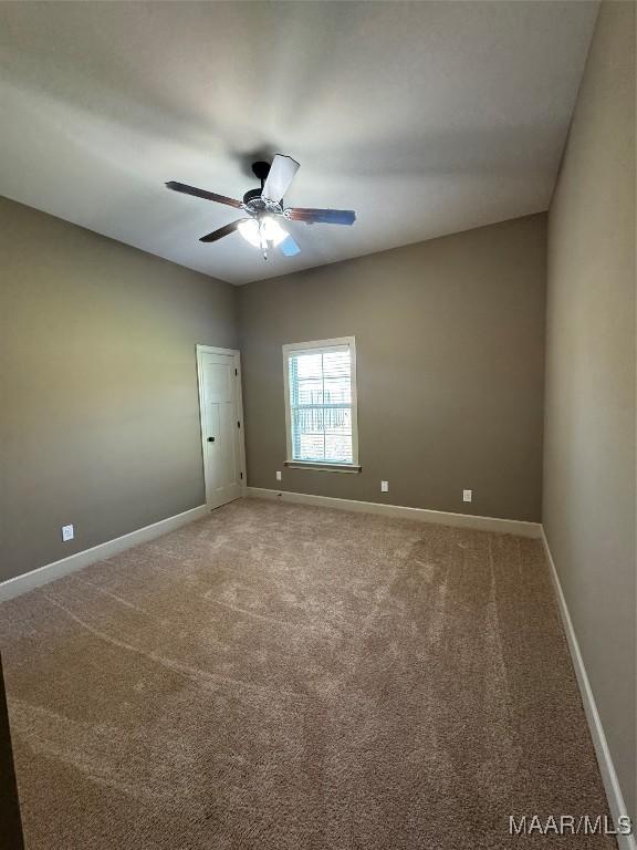 3701 Weston Pl, Montgomery, AL 36116 - carpeted spare room with baseboards and ceiling fan