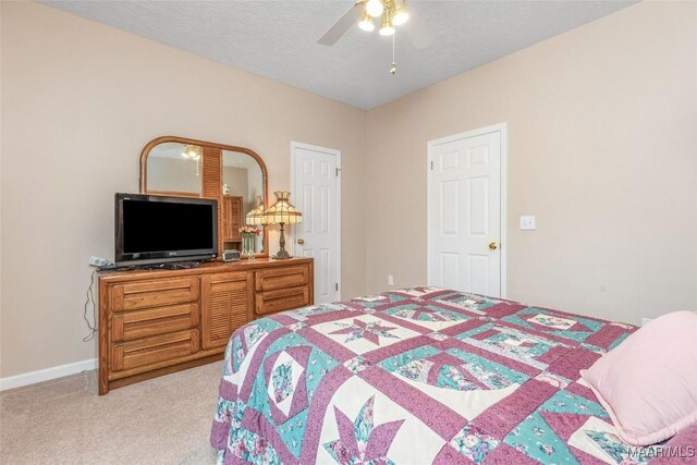 285 Cedar Ridge Dr, Wetumpka, AL 36093 - bedroom with light carpet, ceiling fan, and a textured ceiling