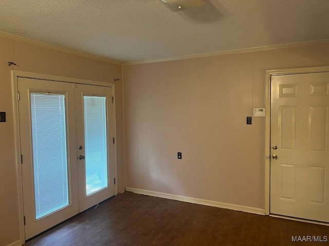649 Partridge Ln, Prattville, AL 36067 - unfurnished room with french doors, crown molding, dark wood-style floors, and a textured ceiling