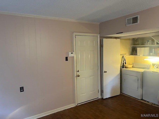 649 Partridge Ln, Prattville, AL 36067 - laundry area with washer and clothes dryer, crown molding, dark wood-type flooring, and a textured ceiling