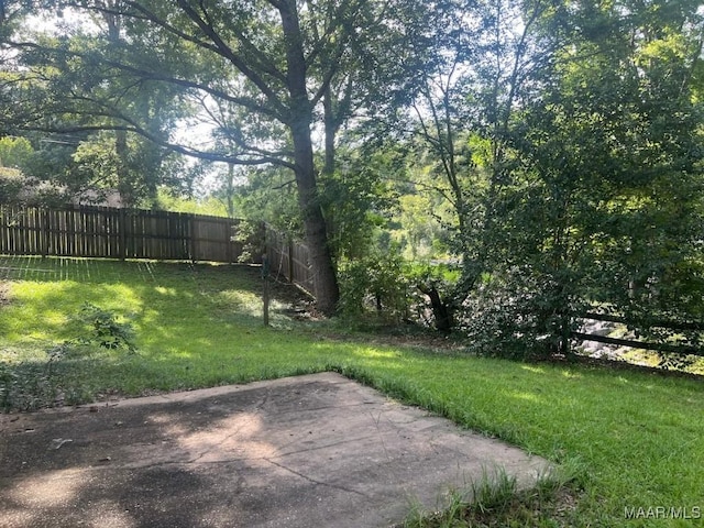 649 Partridge Ln, Prattville, AL 36067 - fenced backyard featuring a patio area