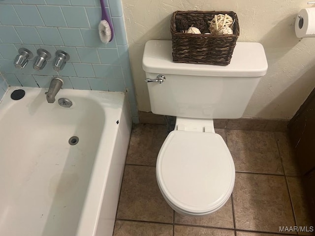 649 Partridge Ln, Prattville, AL 36067 - full bathroom featuring a tub to relax in and tile patterned floors