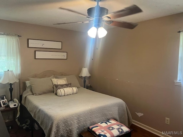 649 Partridge Ln, Prattville, AL 36067 - bedroom featuring ceiling fan and dark wood-style floors