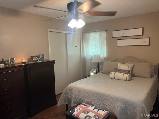 649 Partridge Ln, Prattville, AL 36067 - bedroom featuring a closet, dark wood-style floors, and ceiling fan
