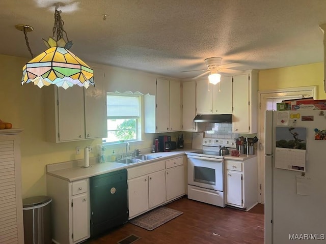 649 Partridge Ln, Prattville, AL 36067 - kitchen with white appliances, under cabinet range hood, light countertops, dark wood-style flooring, and ceiling fan