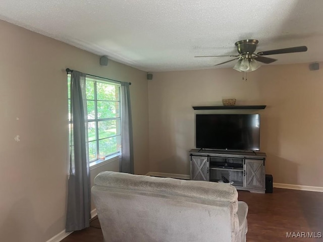 649 Partridge Ln, Prattville, AL 36067 - living area with ceiling fan, a textured ceiling, and dark wood-style floors