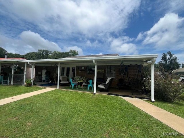 2607 Pine Tree Cir, Selma, AL 36701 - back of house with ceiling fan, a patio area, and brick siding