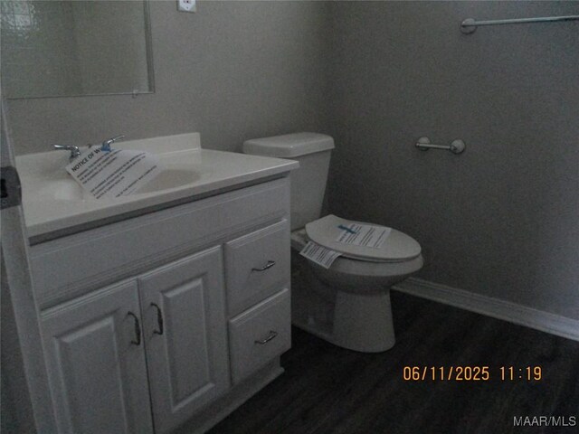 398 Birch Ave, Selma, AL 36701 - bathroom with vanity and wood finished floors