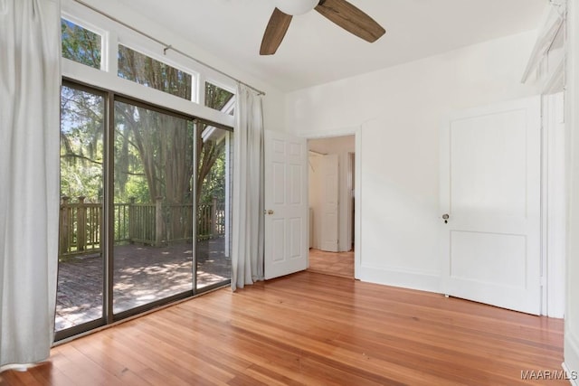 610 Ponce De Leon Ave, Montgomery, AL 36106 - unfurnished bedroom with access to outside, wood finished floors, and ceiling fan