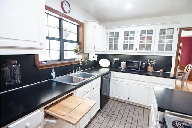 1267 County Road 85th Rd, Prattville, AL 36067 - kitchen featuring black dishwasher, dark countertops, white cabinetry, and glass insert cabinets