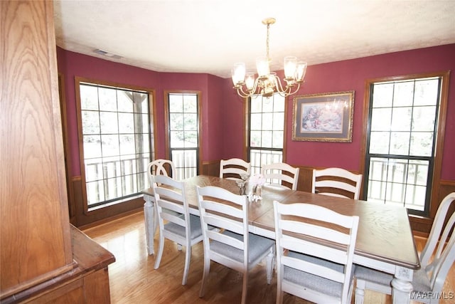 1267 County Road 85th Rd, Prattville, AL 36067 - dining space featuring a chandelier and wood finished floors