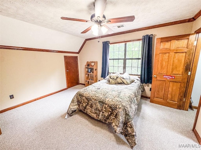 1267 County Road 85th Rd, Prattville, AL 36067 - bedroom with carpet, a textured ceiling, crown molding, vaulted ceiling, and a ceiling fan