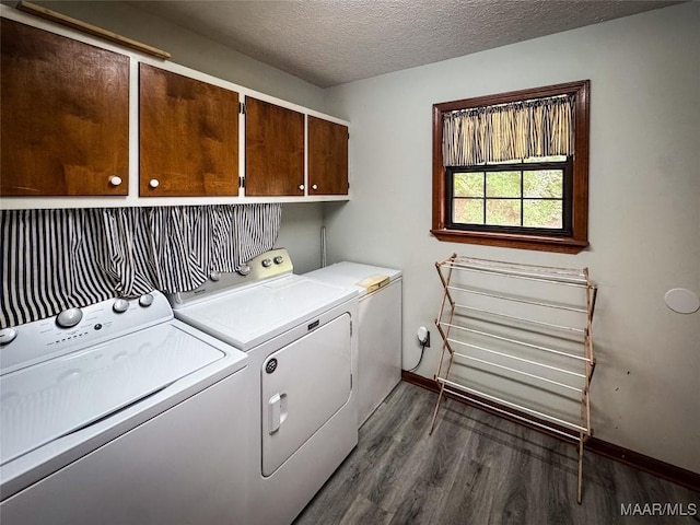 1267 County Road 85th Rd, Prattville, AL 36067 - laundry area featuring cabinet space, washing machine and dryer, dark wood-style flooring, and a textured ceiling