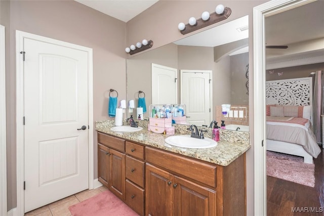 3915 Eagle Ridge Ln, Opelika, AL 36801 - bathroom featuring double vanity, connected bathroom, and tile patterned flooring