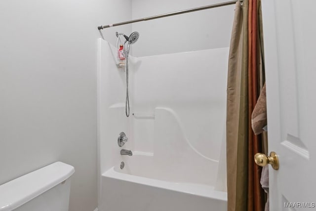 709 Liberty Rd, Tallassee, AL 36078 - bathroom featuring shower / tub combo and toilet