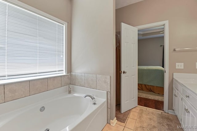709 Liberty Rd, Tallassee, AL 36078 - full bath with vanity, a bath, ensuite bath, and tile patterned floors
