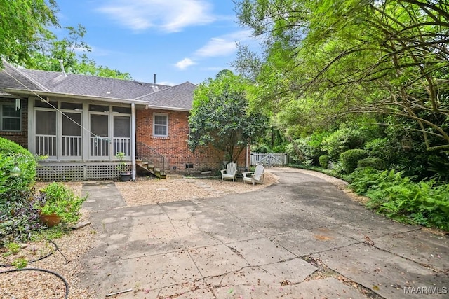 1327 Woodward Ave, Montgomery, AL 36106 - view of patio with a sunroom