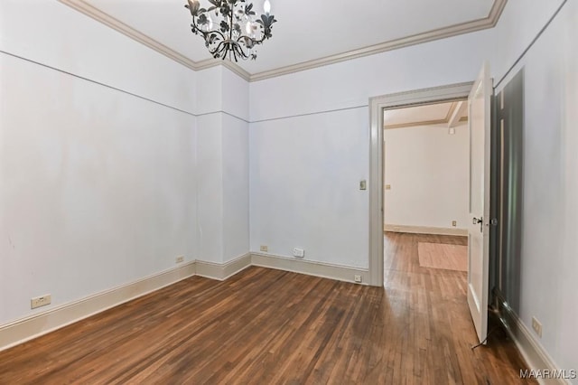 1327 Woodward Ave, Montgomery, AL 36106 - spare room featuring a chandelier, wood finished floors, and crown molding
