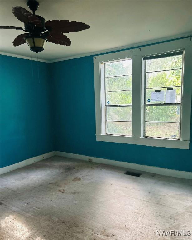 905 Milly Francis St, Wetumpka, AL 36092 - carpeted empty room with ornamental molding, plenty of natural light, and ceiling fan