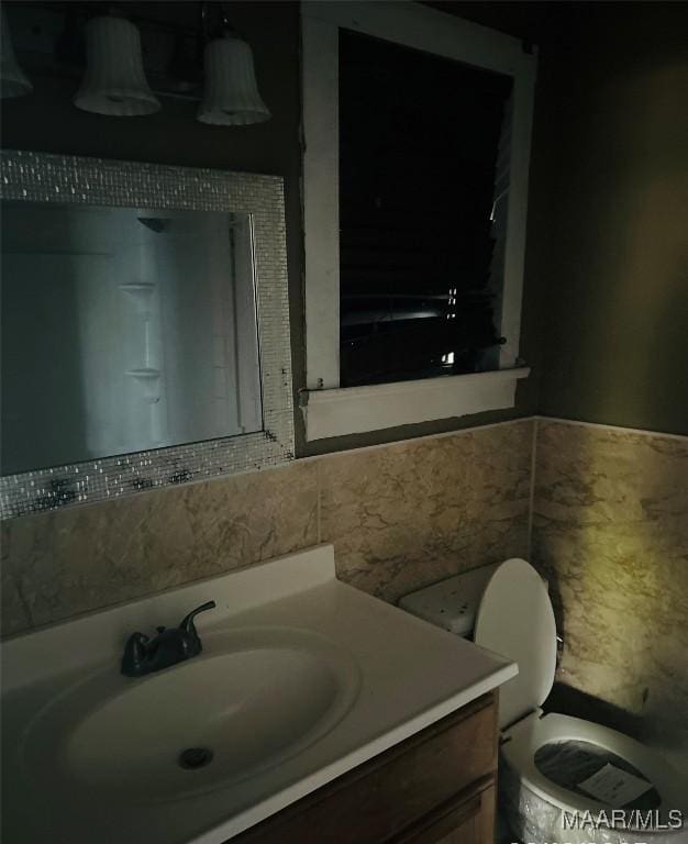 905 Milly Francis St, Wetumpka, AL 36092 - bathroom featuring vanity and tile walls
