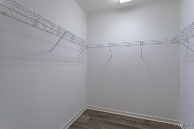 9621 Colleton Pl, Montgomery, AL 36117 - walk in closet with dark wood finished floors