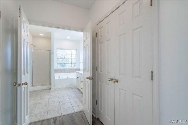9621 Colleton Pl, Montgomery, AL 36117 - full bathroom featuring a shower stall, a garden tub, and a closet
