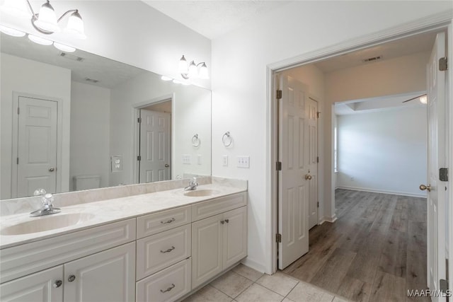 9621 Colleton Pl, Montgomery, AL 36117 - bathroom with double vanity and tile patterned floors