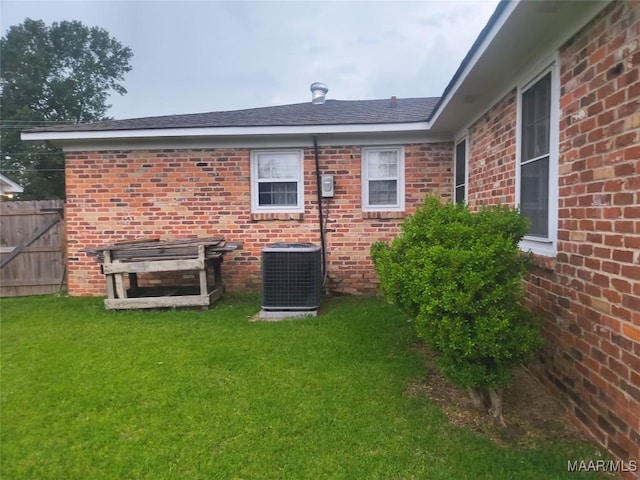 2205 Old Orrville Rd, Selma, AL 36701 - rear view of house featuring brick siding and a shingled roof