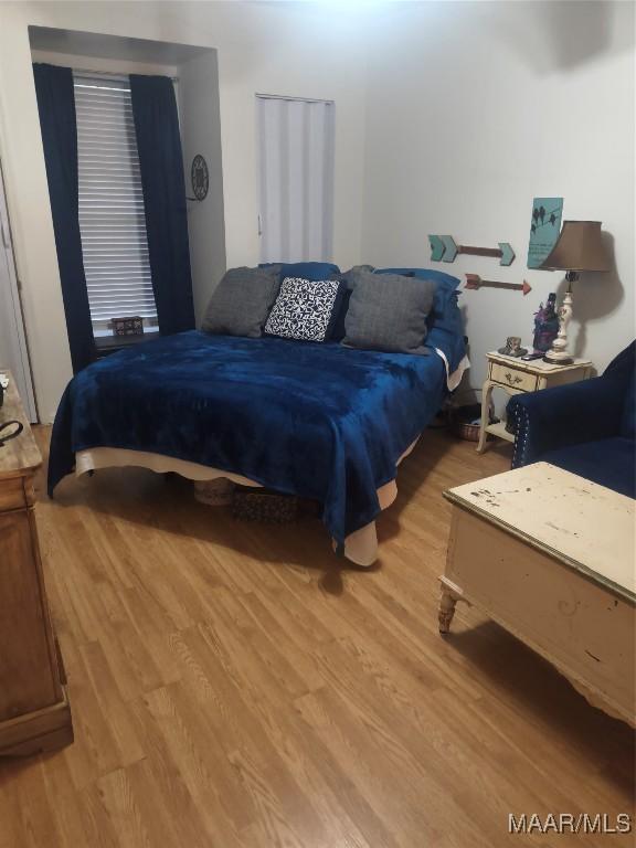 2205 Old Orrville Rd, Selma, AL 36701 - bedroom featuring light wood-type flooring