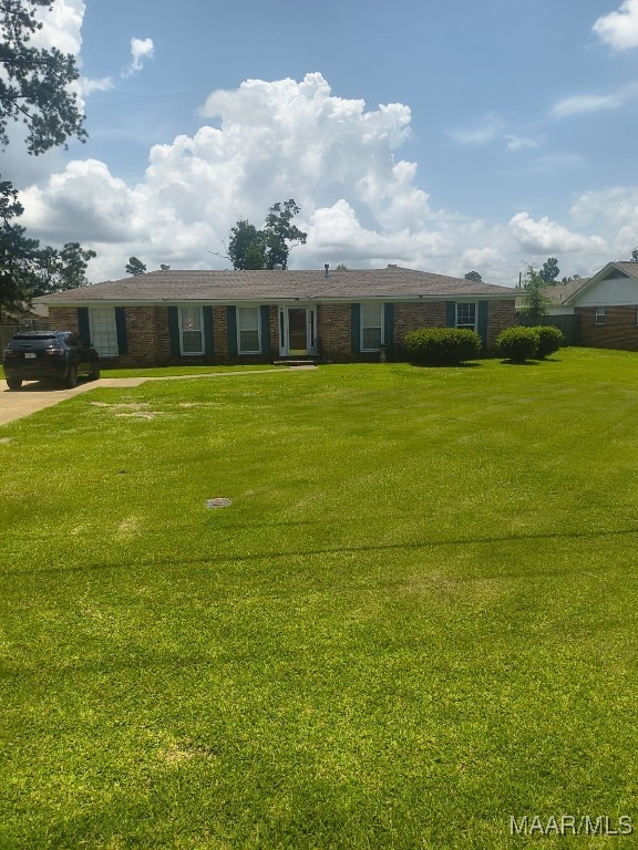 2205 Old Orrville Rd, Selma, AL 36701 - ranch-style house featuring a front lawn and brick siding