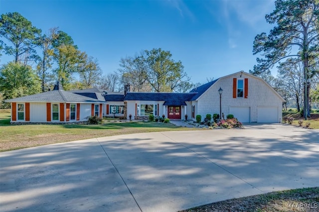 3900 Snowdoun Chambers Rd, Montgomery, AL 36116 - view of front of home with a garage, concrete driveway, a front yard, and a chimney