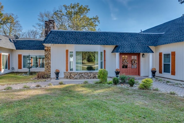 3900 Snowdoun Chambers Rd, Montgomery, AL 36116 - view of front of property featuring a shingled roof, a chimney, a front lawn, and stone siding