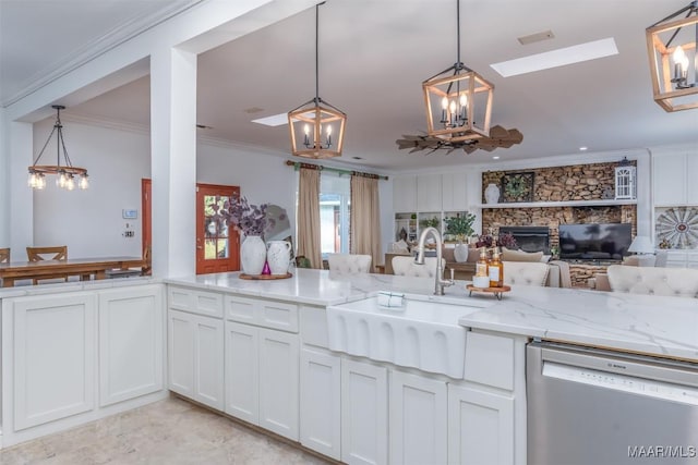 3900 Snowdoun Chambers Rd, Montgomery, AL 36116 - kitchen with dishwasher, a chandelier, open floor plan, light stone countertops, and ornamental molding