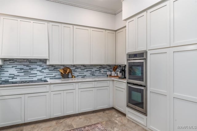 3900 Snowdoun Chambers Rd, Montgomery, AL 36116 - kitchen with double oven, light countertops, decorative backsplash, black electric stovetop, and crown molding