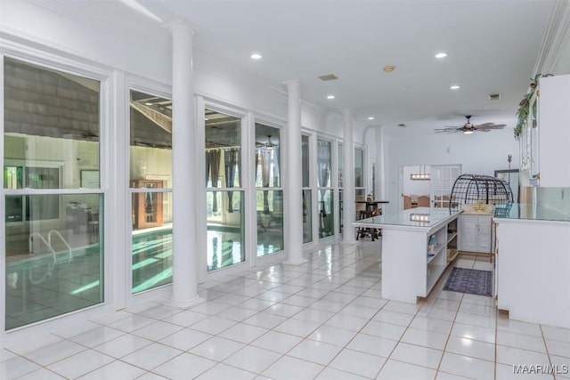 3900 Snowdoun Chambers Rd, Montgomery, AL 36116 - kitchen with open shelves, ornate columns, ceiling fan, recessed lighting, and light tile patterned floors