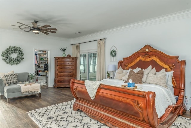 3900 Snowdoun Chambers Rd, Montgomery, AL 36116 - bedroom featuring crown molding, wood finished floors, a walk in closet, a closet, and access to exterior