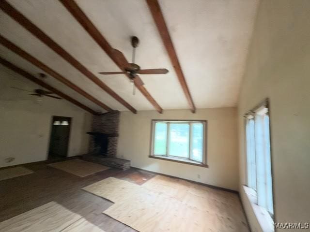 2711 Gwynnbrook Rd, Montgomery, AL 36116 - unfurnished living room featuring a ceiling fan, light wood finished floors, and a large fireplace