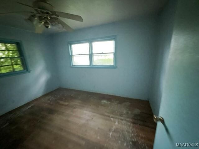 2711 Gwynnbrook Rd, Montgomery, AL 36116 - empty room featuring a ceiling fan and wood finished floors