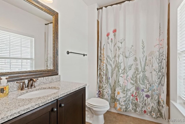 301 Eastgate Dr, Prattville, AL 36066 - full bathroom featuring vanity, tile patterned flooring, and shower / bathtub combination with curtain