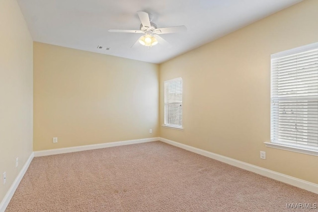 301 Eastgate Dr, Prattville, AL 36066 - empty room featuring a ceiling fan, light carpet, and healthy amount of natural light