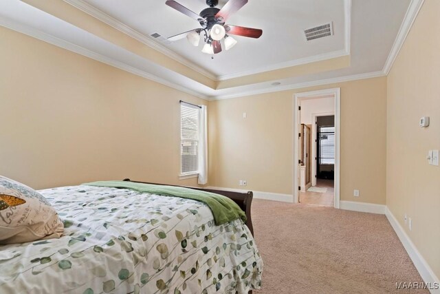 301 Eastgate Dr, Prattville, AL 36066 - bedroom featuring a tray ceiling, carpet floors, crown molding, and ceiling fan